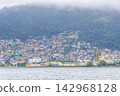Mountains with favelas houses tropical nature Angra dos Reis Brazil. 142968128