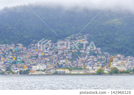Mountains with favelas houses tropical nature Angra dos Reis Brazil. Mountains with favelas houses tropical nature Angra dos Reis Brazil. 142968128