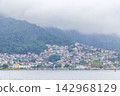 Mountains with favelas houses tropical nature Angra dos Reis Brazil. 142968129