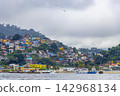 Mountains with favelas houses tropical nature Angra dos Reis Brazil. 142968134