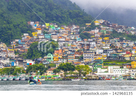 Mountains with favelas houses tropical nature Angra dos Reis Brazil. Mountains with favelas houses tropical nature Angra dos Reis Brazil. 142968135
