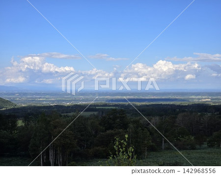 A magnificent landscape overlooking the vast Tokachi Plain of Hokkaido. A magnificent landscape overlooking the vast Tokachi Plain of Hokkaido. 142968556