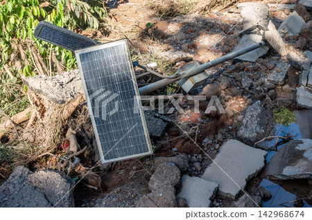 Solar panel poles collapsed after Kok river flooded in Chiang Rai province of Thailand. Solar panel poles collapsed after Kok river flooded in Chiang Rai province of Thailand. 142968674