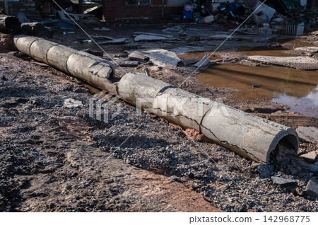 Cement pipe having damaged after Kok river rising and flooded the downtown of Chiang Rai province, Thailand. Cement pipe having damaged after Kok river rising and flooded the downtown of Chiang Rai province, Thailand. 142968775
