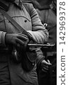 Russian Soviet Infantry Soldier Of World War II With Sub-machine Gun Weapon. Red Army Soldier Of WWII WW2 Times Russian Soviet Infantry Soldier Of World War II With Sub-machine Gun Weapon. Red Army Soldier Of WWII WW2 Times 142969378