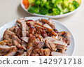 Roasted meat slices with steamed vegetable side dish 142971718