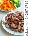 Roasted pork slice with steamed vegetable side dish for balanced meal 142971719
