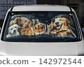 Car sunshade with a picture of a dog 142972544