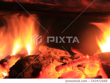 Burning fire logs Burning fire logs 142972889