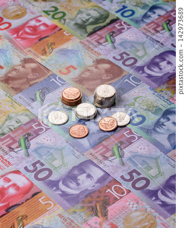 New Zealand paper money, dollar banknotes and cent coins as currency for exchange or travel New Zealand paper money, dollar banknotes and cent coins as currency for exchange or travel 142973689