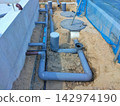 Waterworks at construction site 142974190