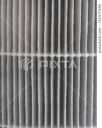 Surface of nylon mesh and filter paper in the dust filter Surface of nylon mesh and filter paper in the dust filter 142975846