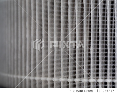 Surface of nylon mesh and filter paper in the dust filter Surface of nylon mesh and filter paper in the dust filter 142975847