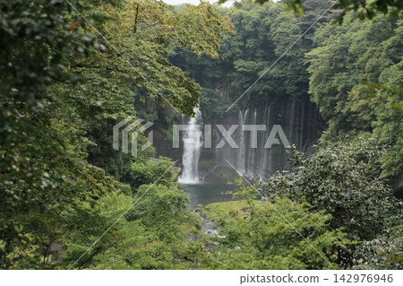 Waterfall flowing down the valley 142976946