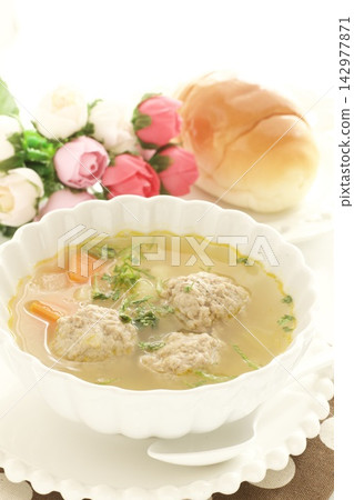 Meatball and vegetable soup and butter rolls Meatball and vegetable soup and butter rolls 142977871
