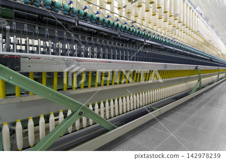 Textile Factory Spinning Machine with Yarn Cones Textile Factory Spinning Machine with Yarn Cones 142978239