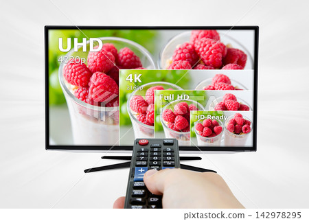 4K UHD Television Screen With Remote Control and Resolution Comparison 4K UHD Television Screen With Remote Control and Resolution Comparison 142978295