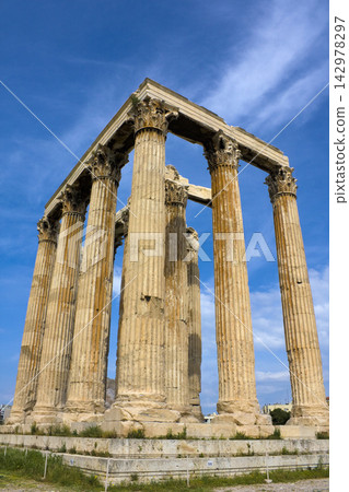 Ancient Greek Temple Columns in Athens Under Blue Sky Ancient Greek Temple Columns in Athens Under Blue Sky 142978297