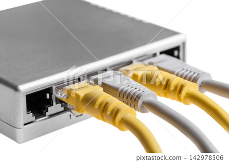 Ethernet Cables Connected to Network Switch Ports Ethernet Cables Connected to Network Switch Ports 142978506