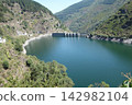 Grandas de Salime, Spain - August 25, 2024: Central Hidroelectrica, Hydroelectric Power Station. The Salime Reservoir is formed by a 128 meters high Gravity dam 142982104