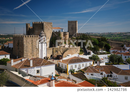 Exploring Obidos medieval castle and traditional houses in Portugal Exploring Obidos medieval castle and traditional houses in Portugal 142982786