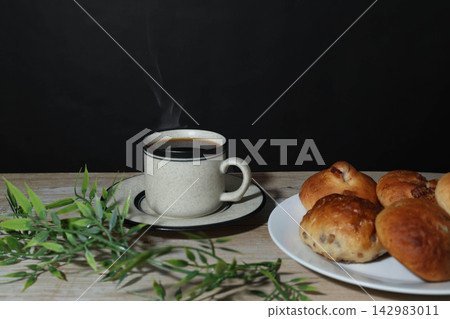 An image of breakfast with a warm cup of coffee An image of breakfast with a warm cup of coffee 142983011