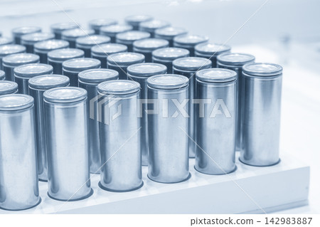 A group of cell batteries for EV cars in a blue tone scene A group of cell batteries for EV cars in a blue tone scene 142983887