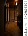 The dimly lit, slightly eerie corridor of an old house 142984394