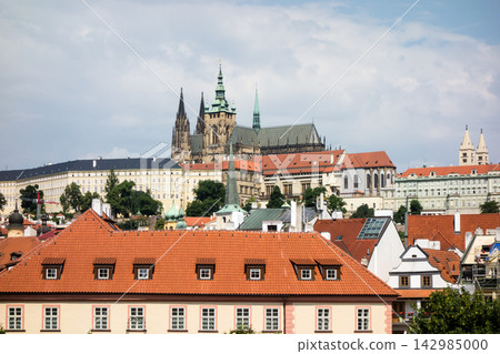 Historic stone buildings in the bright sunlight: the cityscape of Prague, the capital of the Czech Republic. Historic stone buildings in the bright sunlight: the cityscape of Prague, the capital of the Czech Republic. 142985000