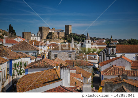 Obidos Portugal castle town rooftops in close skyline view 142985041