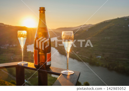 Sparkling Wine Glasses Over Douro River at Sunrise Portugal 142985052