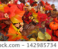 Colorful artificial autumn berries and leaves 142985734