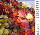 Colorful artificial autumn berries and leaves 142985735