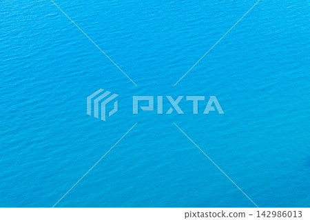 water ripple surface calm tranquil blue color background wide copy space wallpaper mock up pattern water ripple surface calm tranquil blue color background wide copy space wallpaper mock up pattern 142986013
