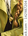 Cozy autumn fashion with green coat and unique ceramic matcha cup necklace 142987204