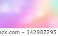 Blurred peach and pink gradient background with soft orange grain texture. 142987295