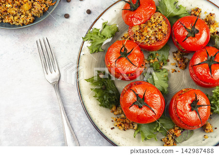Mediterranean Style Stuffed Tomatoes with Quinoa and Vegetables Mediterranean Style Stuffed Tomatoes with Quinoa and Vegetables 142987488