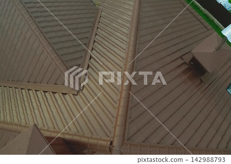 Corrugated metal roof and metal roofing. Modern roof made of met Corrugated metal roof and metal roofing. Modern roof made of met 142988793