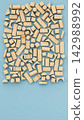 Wooden Geometric Building Blocks Flat Lay on Blue Background with Copy Space, 3D Render 142988992