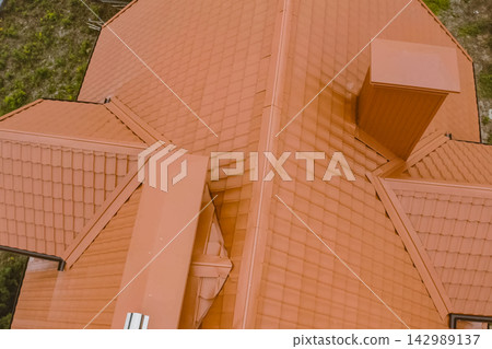 Corrugated metal roof and metal roofing. Modern roof made of metal. 142989137