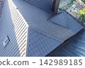 Corrugated metal roof and metal roofing. Modern roof made of metal. 142989185