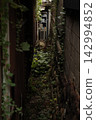 The gap between old houses 142994852