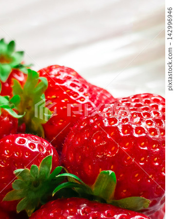 Close up texture of fresh red strawberries top view Close up texture of fresh red strawberries top view 142996946