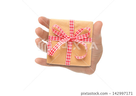 New Year 2027. Hand presents beautifully wrapped gift, symbolizing joy and togetherness, PNG New Year 2027. Hand presents beautifully wrapped gift, symbolizing joy and togetherness, PNG 142997171