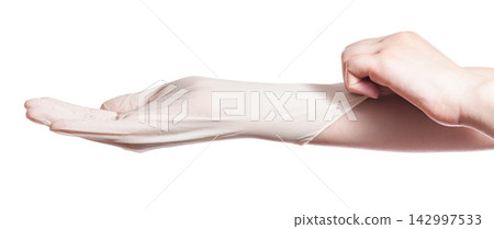 Medical Glove on Hand Isolated on White Background Medical Glove on Hand Isolated on White Background 142997533