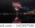 Fireworks reflected in the water 142997586