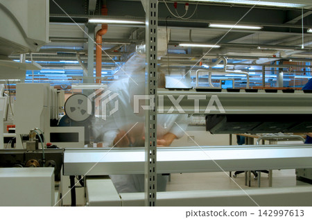 Laboratory Manufacturing Cleanroom with Researchers and Equipment Laboratory Manufacturing Cleanroom with Researchers and Equipment 142997613
