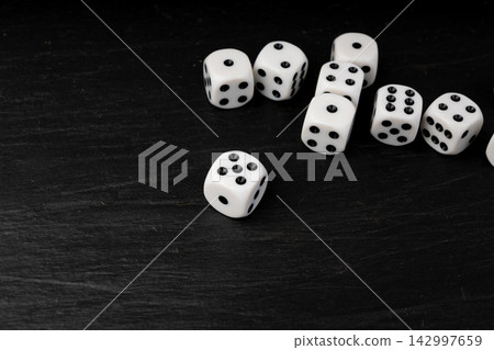 White game dice with black dots 142997659