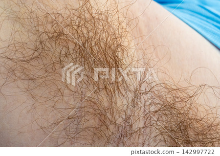 Hairy human skin, close view of male arm or leg, body hair, natural fur pattern Hairy human skin, close view of male arm or leg, body hair, natural fur pattern 142997722