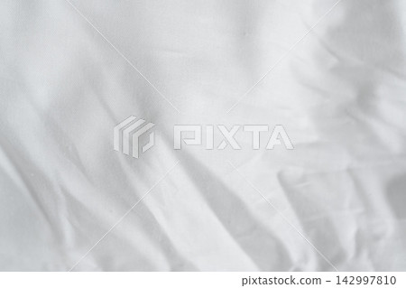 White bed sheet background White bed sheet background 142997810
